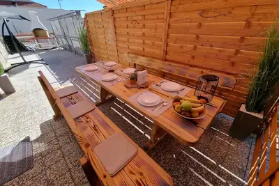Image de Wohnung mit Terrasse und Grill in Strandnähe by Interhome
