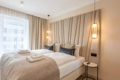 Image de in den Sun Towers am Meer by Interhome