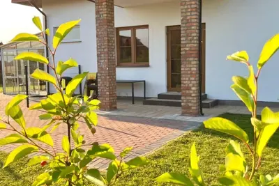 Image de Komfortable Wohnung mit Garten, in der Nähe des Meeres by Interhome