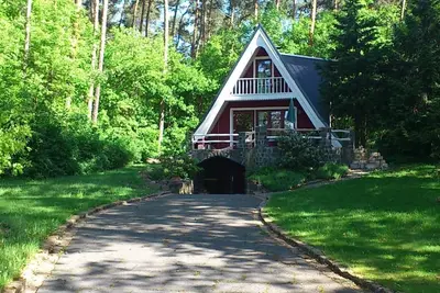 Image de in ruhiger Lage am Waldrand mit Terrasse und großem Grundstück by Interhome