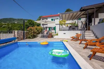 Image de Villa Leticija - Luxusvilla mit beheiztem Pool, Sauna, Fitness & Grillplatz in by Interhome