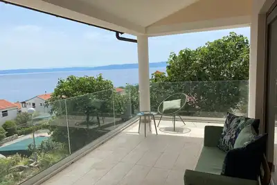 Image de Frisch renovierte Ferienwohnung mit Meerblick by Interhome