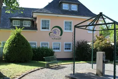 Image de Schöne Ferienwohnung in Daun mit Garten by Interhome