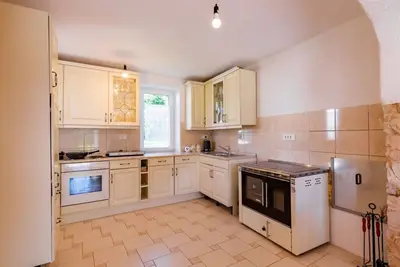 Image de Schönes Apartment in Gozd mit Garten, tollem Ausblick by Interhome