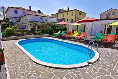 Image de Apartment Nika 4 in der Residenz mit Pool und Whirlpool in Strandnähe by Interhome