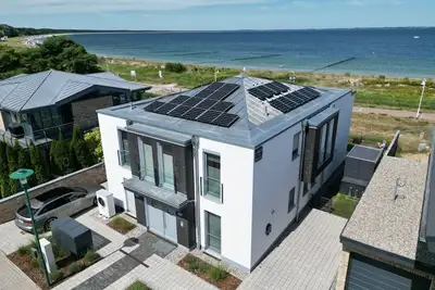 Image de exclusives Apartement in Glowe Villa Am Meer Og by Interhome
