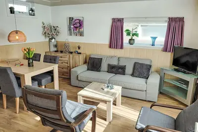 Image de Sommerhaus in ruhiger Lage mit privatem Garten und Terrasse by Interhome