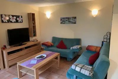 Image de am Wasser mit Terrasse und Kaminofen by Interhome