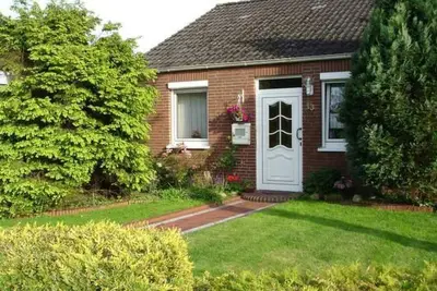 Image de in Hage mit Garten, Terrasse und Grill by Interhome