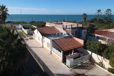 Image de Kairòs, Wohnung 10 m vom Sandstrand entfernt by Interhome