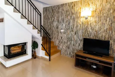 Image de Ganzjährig bewohnbares Ferienhaus direkt am Strand von Dźwirzyno by Interhome