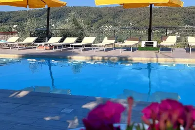 Image de Brandneue Wohnung in Villa mit Schwimmbad by Interhome