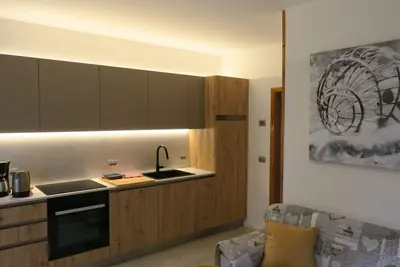 Image de Erdgeschosswohnung mit möbliertem Garten by Interhome