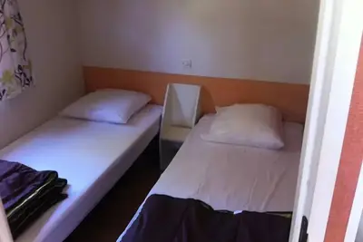 Image de Mobil Home 30m² 2 chambres n° 33 Terrasse couverte Samedi/Samedi 2/4 pers. 4 personnes