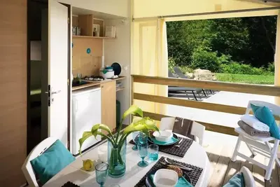 Image de Tithome - 2 chambres - sanitaires collectifs camping 21 m2 4 à 6 personnes - 4 pers. inclus dans le tarif