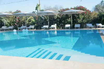 Image de Boomerang Home 9 – Suite nel Boomerang Village Resort 4 Stelle – a pochi minuti da Punta Prosciutto