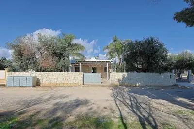 Image de Boomerang Villas 1 – Villa con piscina privata e giardino nel Boomerang Village – a soli 2 minuti dai Caribi del Salento