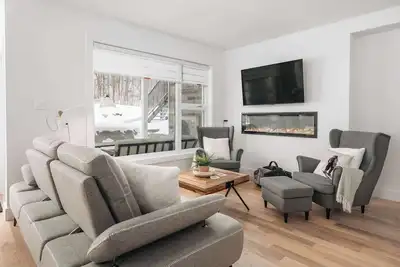 Image de Condo neuf - élégance, lac & vélo de montagne