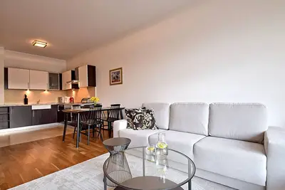 Image de Luxuriöse Wohnung auf einer Düne mit Meerblick by Interhome