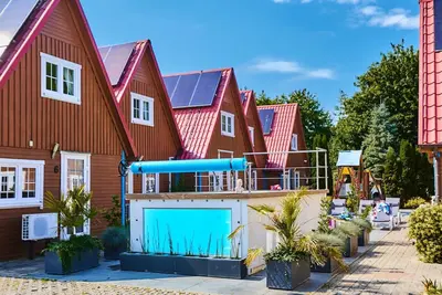 Bootshaus mit beheiztem Pool by Interhome