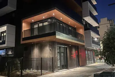 Image de Modern, exclusive City Centre apartment in walking distance of stadium and Cbd