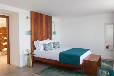 Image de Chambre « Quarto 2 - Quadruple Adaptée » avec vue mer, Wi-Fi et climatisation
