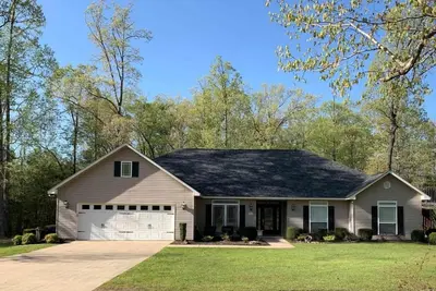 Image de 4-bedroom Home Away from Home