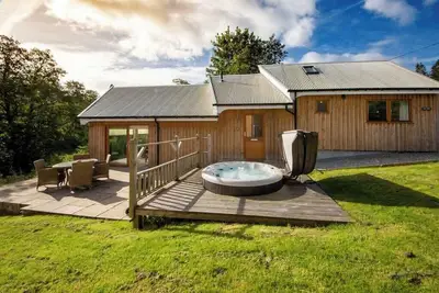 Image de Beautiful river fronted house with private hot tub