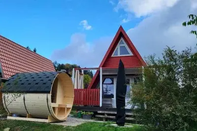 Image de Haus am See mit Fasssauna, Liegewiese und Grill by Interhome