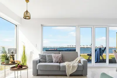 Image de DreamLounge - 1st row by the water, infrared cabin, whirlpool, terrace