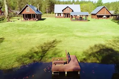 Image de Charmante Waldvilla Dzukijos Uoga am See by Interhome