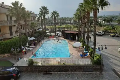 Image de Etna Wohnung in einer Residenz by Interhome