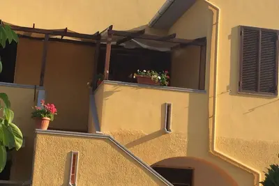 Image de Appartement « Via Gorizia 8 - Jaune » avec jardin commun, Wi-Fi et climatisation