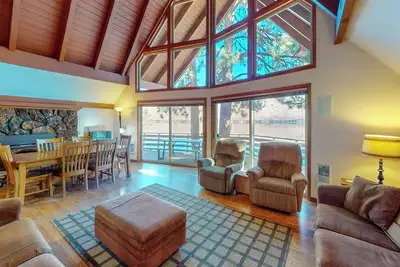 Image de Three-story Wallowa Lake home is the perfect retreat for families, friends, or anyone dreaming of a serene lakeside experience. Room for everyone to spread out  and direct lake access, this home is designed for memorable mountain-lake vacations.