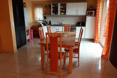 Image de Spacious vacation home right on the lake with terrace, fireplace and own rowing boat