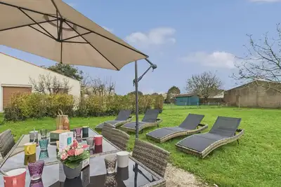 Image de 500m de la plage, maison avec jardin pour 6