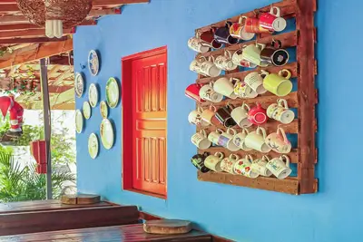 Image de Suite em Pousada em Rio Grande com Vista e Lago