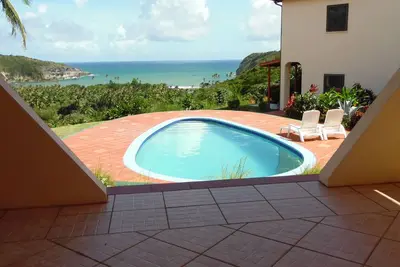 Image de Serene Hideaway: Luxury 4-Bedroom Villa, Breathtaking Ocean Views & Lush Gardens