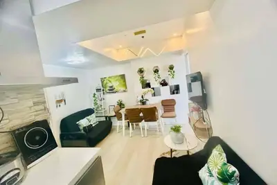 A Cozy Two-Bedroom Escape with Balcony