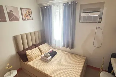 Image de Cozy 1-bedroom apartment in perfect Quezon City with Ac