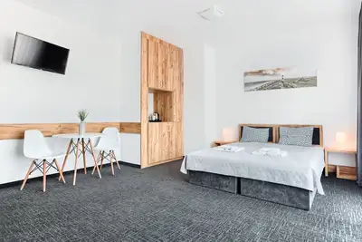 Image de Morska 4 | Jarosławiec | Bright Studio | Swimming Pool | Pet Friendly | 12 minutes to the beach