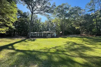 Image de 3/2 house w/ private boat launch, full lake view porch. Sleeps 8-10. Parking+