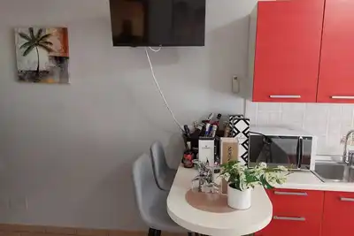 Image de Hébergement avec terrasse et parking