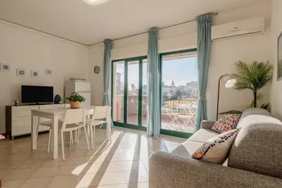 Image de GuestHost - A comfortable and welcoming 55 square meters apartment, perfect for four people, located on the fifth floor of a building with an elevator (Not accessible to disabled guests). The property is located in a quiet area not far from the center of
