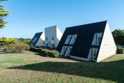 Image de Appartement en bord de mer avec piscine chauffée