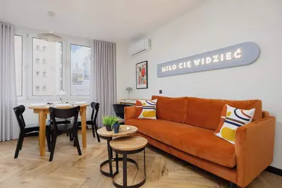 Image de Królewska 45 Warszawa | Blue and Orange Apartment in the City Center with Air Conditioned Living Room