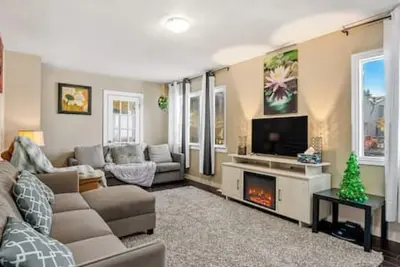 Image de Cozy 4 Br Home close to Winsport & Bowness Park