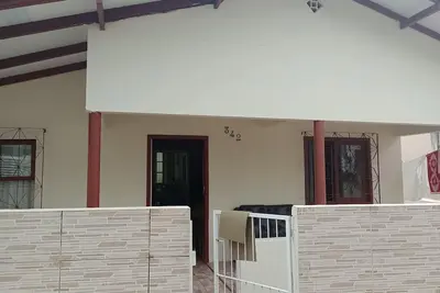 Image de Simple house in the center of Itapema – near the beach. Simple and cozy house.