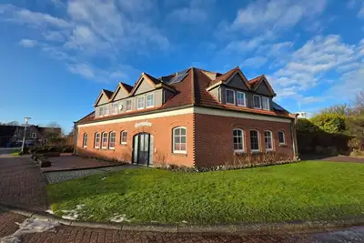 Image de Gezeitenhaus Bensersiel - Holiday apartment Strandläufer