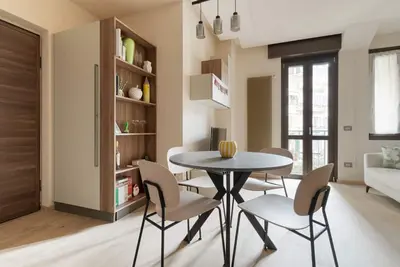 Image de Modern and cozy 45 sqm apartment, ideal for 2 guests, located on the 2nd floor of a building with an elevator (Not suitable for disabled guests) in the Bullona area. The property is set in a strategic location, just a few minutes’ walk from the “Gerus